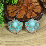 Wind leaf round openwork turquoise earrings