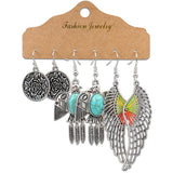 Snow tassel love wing earrings