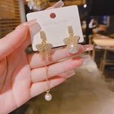 S925 Silver Needle Pearl tassel openwork asymmetric bow long earrings