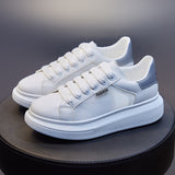 Couple ins McQueen little white shoes women's 2023 spring new student board shoes women's thick-soled breathable men's tide 6601