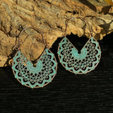 Irregular leaves hollowed out turquoise earrings