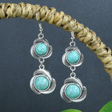 Turquoise earrings with wind flowers and water drops