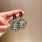 Round leopard print geometric earrings