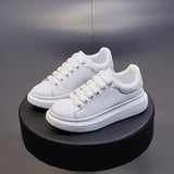 Couple ins McQueen little white shoes women's 2023 spring new student board shoes women's thick-soled breathable men's tide 6601