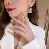 S925 silver needle knotted diamond earrings