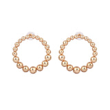 Pearl gold geometric earrings