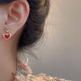 Simple and small red love earrings