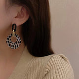 Round leopard print geometric earrings