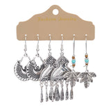 Irregular silver butterfly tassel earrings