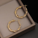 S925 silver needle twist design earrings
