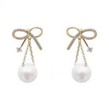 S925 silver needle tide pearl bow earrings