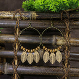Leaf hoop metallic leather fringed earrings
