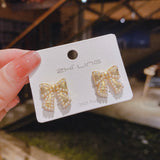 WHOLESALE pearl bow small fragrance earrings