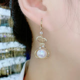 Red purse pearl earrings