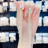Stylish fringed rhinestone long S925 silver pin earrings