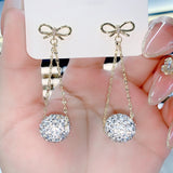 Bow red diamond ball earrings