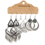 Snow tassel love wing earrings