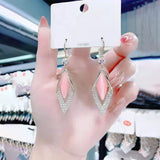 Geometric long diamond earrings