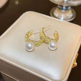 S925 silver needle simple inlaid hollow pearl earrings
