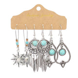 Irregular silver butterfly tassel earrings