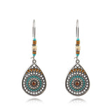 Round openwork bohemian earrings
