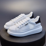 Couple ins McQueen little white shoes women's 2023 spring new student board shoes women's thick-soled breathable men's tide 6601