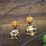 Fashion retro wooden beads hand-woven geometric hollow tassel earrings