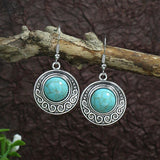 Turquoise earrings with wind flowers and water drops