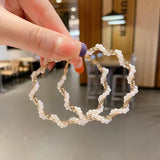 S925 silver needle fashion wrapped pearl earrings
