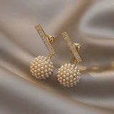 Round pearl-set earrings