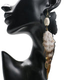 Long feather earrings