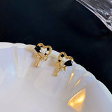 Skeleton love earrings