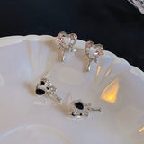 Skeleton love earrings