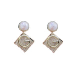 Geometric diamond-shaped pearl S925 silver pin letter earrings