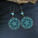 Wind leaf round openwork turquoise earrings