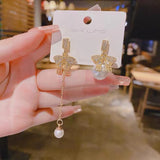S925 Silver Needle Pearl tassel openwork asymmetric bow long earrings