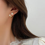 About S925 silver needle pearl earrings
