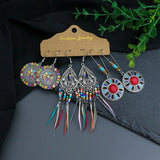 Drop-shaped tassel turquoise feather flower earrings