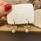 S925 silver needle new simple bow pearl earrings