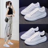 Couple ins McQueen little white shoes women's 2023 spring new student board shoes women's thick-soled breathable men's tide 6601