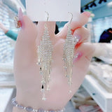 Geometric diamond tassel earrings