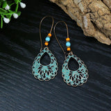 Wind leaf round openwork turquoise earrings