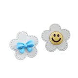 S925 silver needle white flower bow smiley earrings
