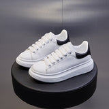 Couple ins McQueen little white shoes women's 2023 spring new student board shoes women's thick-soled breathable men's tide 6601