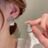 French romantic bouquet with pearl earrings