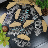 Irregular silver butterfly tassel earrings