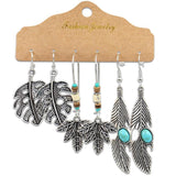 Irregular silver butterfly tassel earrings