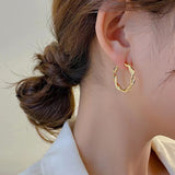 S925 silver needle twist design earrings