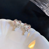 Skeleton love earrings