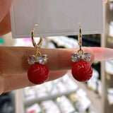 Zircon bow pearl earrings